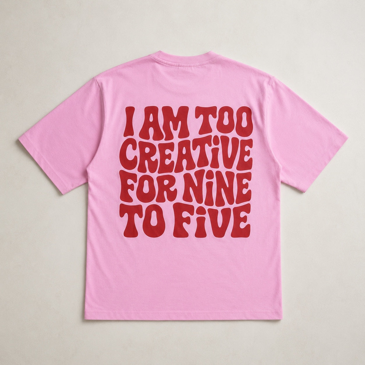 Baby pink oversized graphic t-shirt front view flat lay by The 24 Carrots