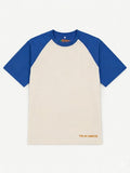Blue raglan oversized t-shirt front view flat lay by The 24 Carrots