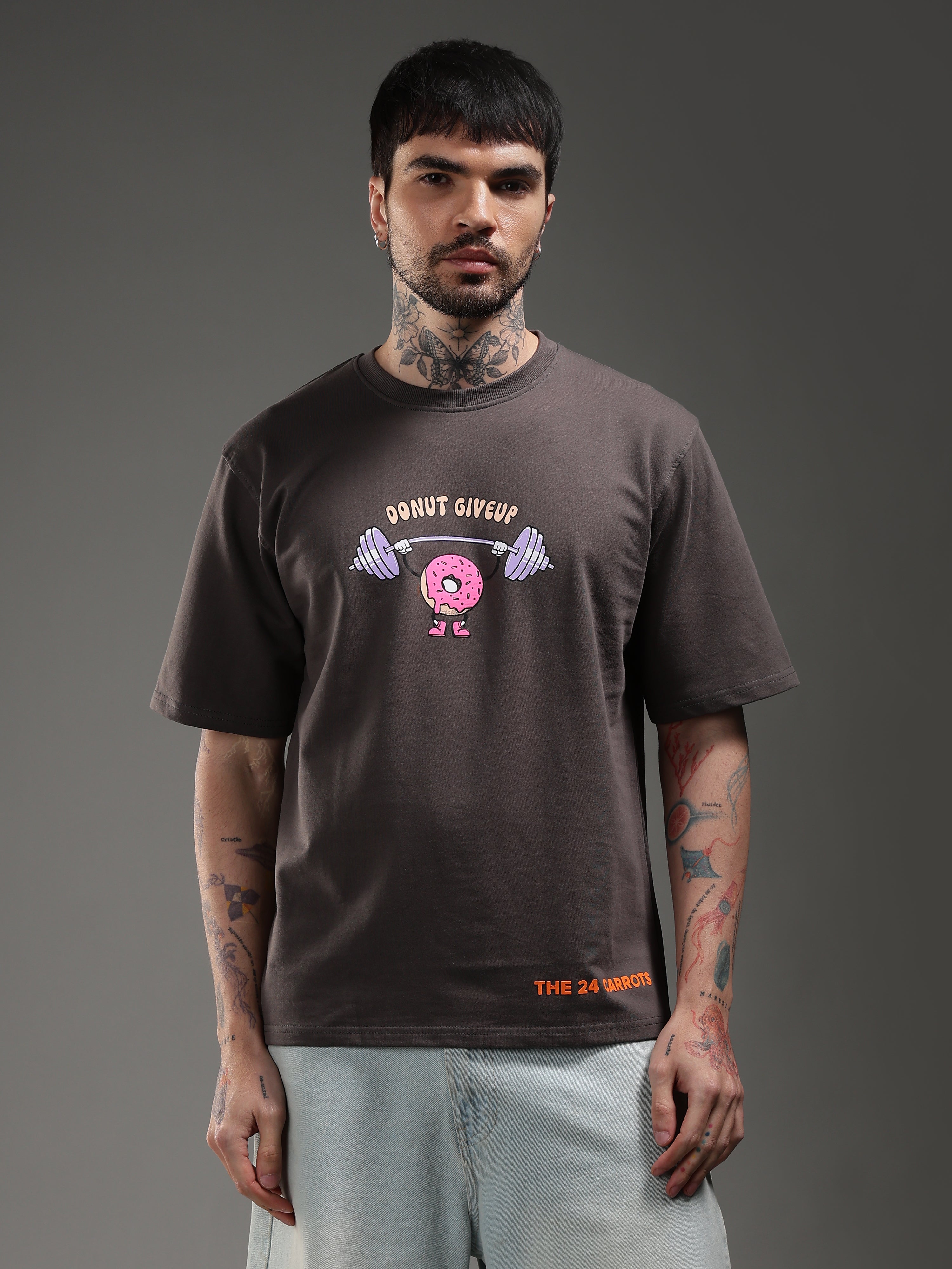 Model wearing Donut Give Up oversized gym t-shirt front view