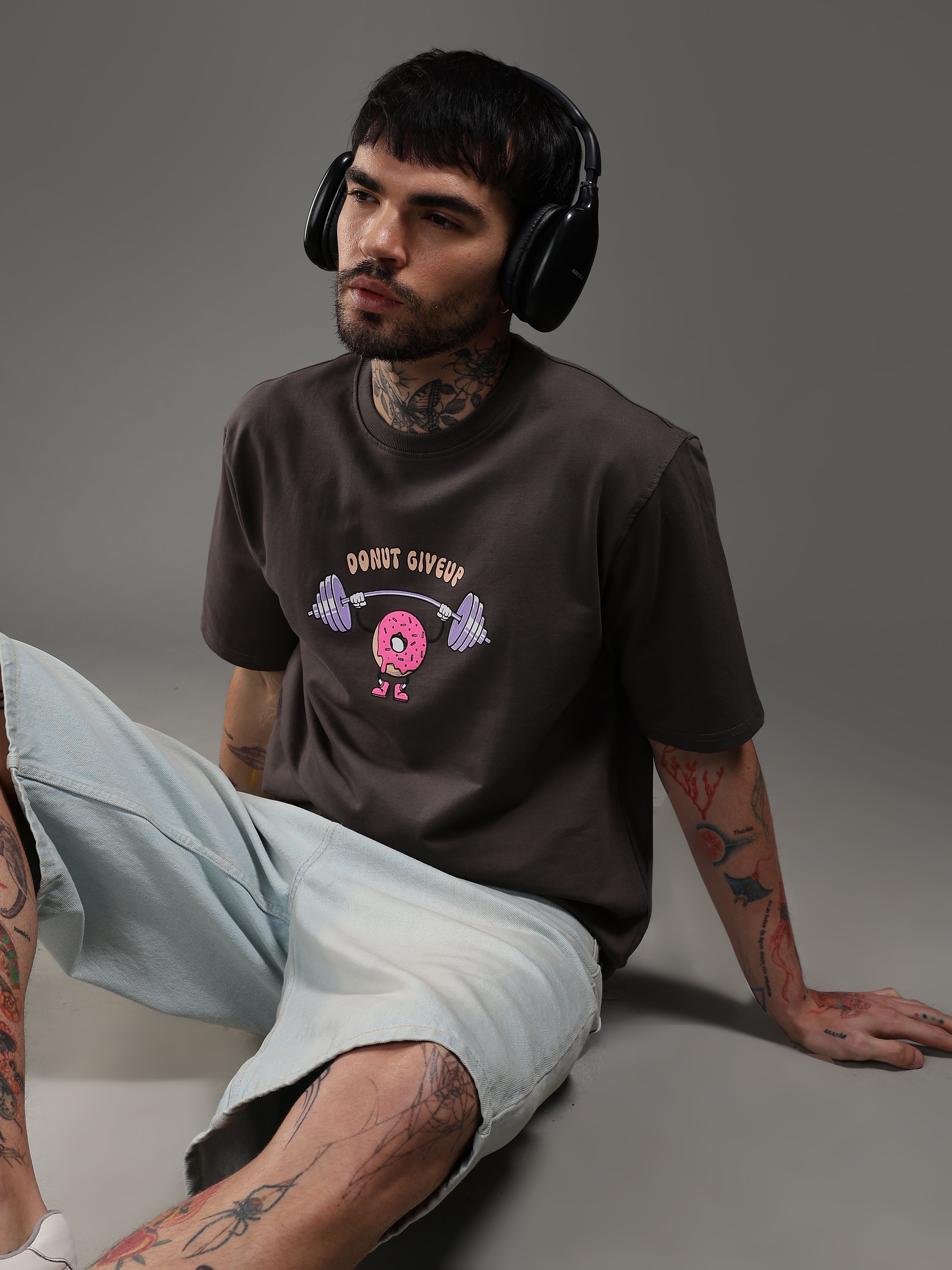 Stylish pose model wearing oversized gym t-shirt front streetwear India
