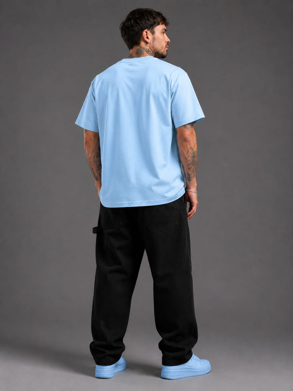 Man wearing Full Snack Developer oversized sky blue T-shirt back view