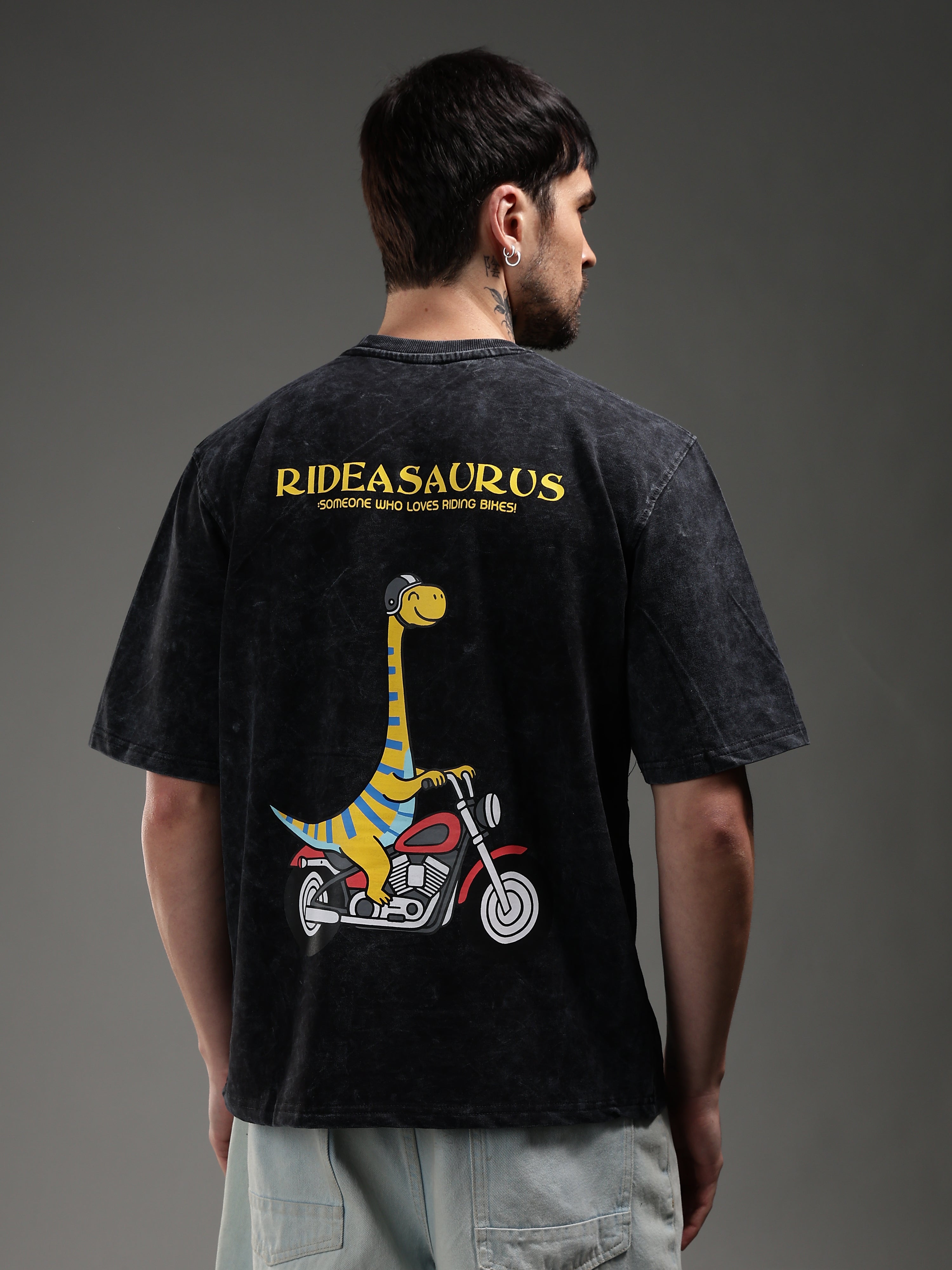 Model wearing Rideasaurus biker t-shirt back streetwear outfit