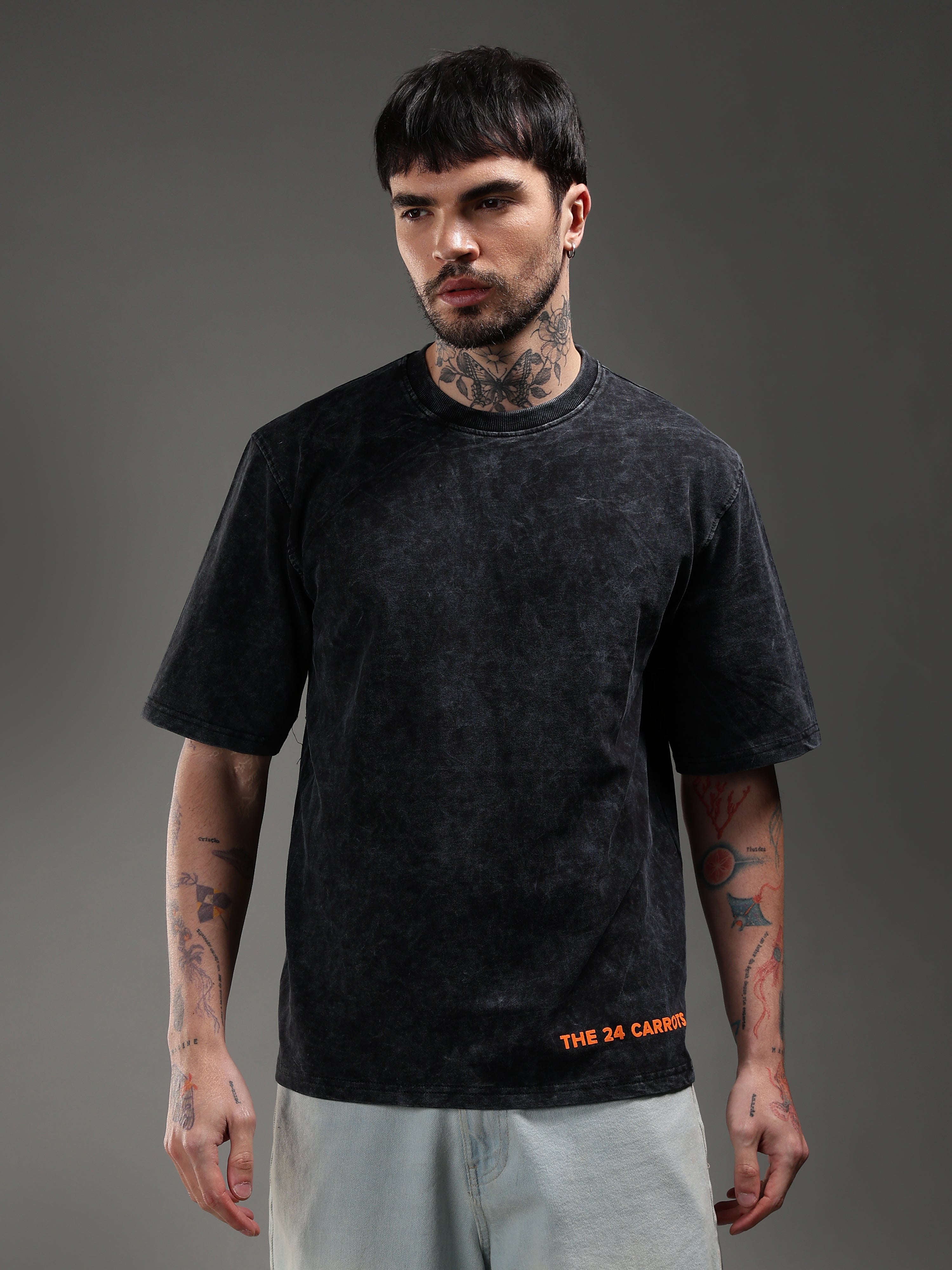 Model wearing Rideasaurus oversized biker t-shirt front view